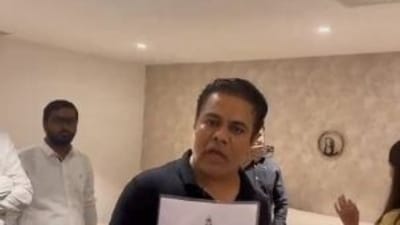 Kavitha's brother KTR at her residence on Friday afternoon arguing with ED officials.