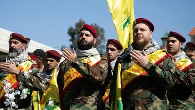 Hezbollah militants (AFP) Hezbollah militants (AFP)