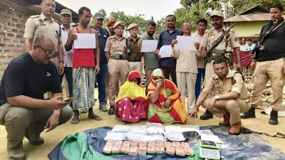 Police with the women smugglers after the drug bust. (Sourced photo) Police with the women smugglers after the drug bust. (Sourced photo)