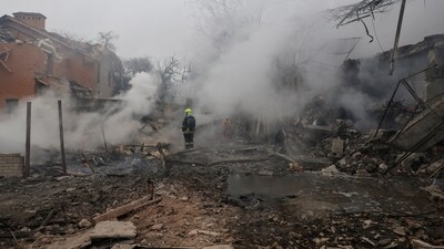 A rescuer stands in a residential area hit by a Russian missile strike, amid Russia's attack on Ukraine, in Odesa, Ukraine (REUTERS)