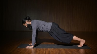 3. Plank Pose (Santolanasana): Begin in a push-up position with your arms straight and shoulders directly above your wrists. Engage your core muscles and keep your body in a straight line from head to heels. Hold the pose for 30 seconds to 1 minute, focusing on keeping your arms strong and steady. (Grand Master Akshar) 3. Plank Pose (Santolanasana): Begin in a push-up position with your arms straight and shoulders directly above your wrists. Engage your core muscles and keep your body in a straight line from head to heels. Hold the pose for 30 seconds to 1 minute, focusing on keeping your arms strong and steady. (Grand Master Akshar)