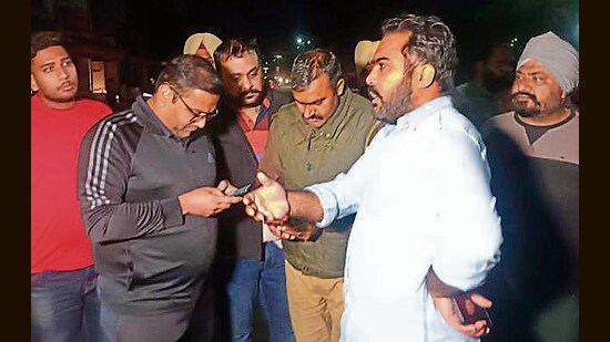 Police investigating at the spot near Kochar Market Chowk in Ludhiana on Friday. (HT Photo)