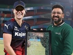 Ellyse Perry received a framed broken window as a gift. Ellyse Perry received a framed broken window as a gift.