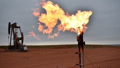 FILE - A flare burns natural gas at an oil well Aug. 26, 2021, in Watford City, (AP Photo/Matthew Brown, File) (AP) FILE - A flare burns natural gas at an oil well Aug. 26, 2021, in Watford City, (AP Photo/Matthew Brown, File) (AP)