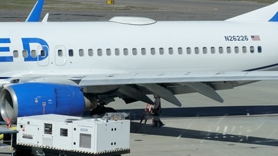 A Medford Jet Center worker walks under a United Boeing 737-824 that landed at Rogue Valley International-Medford Airport from San Francisco with a missing panel Friday, March 15, 2024, in Medford, Ore. (Andy Atkinson/Rogue Valley Times via AP) (AP) A Medford Jet Center worker walks under a United Boeing 737-824 that landed at Rogue Valley International-Medford Airport from San Francisco with a missing panel Friday, March 15, 2024, in Medford, Ore. (Andy Atkinson/Rogue Valley Times via AP) (AP)