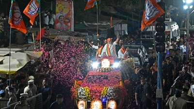 India�s Prime Minister Narendra Modi (C) waves to his supporters from atop a vehicle during a road show as part of Bharatiya Janata Party's (BJP) election campaign ahead of national elections in Hyderabad on March 15, 2024. (Photo by Noah SEELAM / AFP) (AFP) India�s Prime Minister Narendra Modi (C) waves to his supporters from atop a vehicle during a road show as part of Bharatiya Janata Party's (BJP) election campaign ahead of national elections in Hyderabad on March 15, 2024. (Photo by Noah SEELAM / AFP) (AFP)