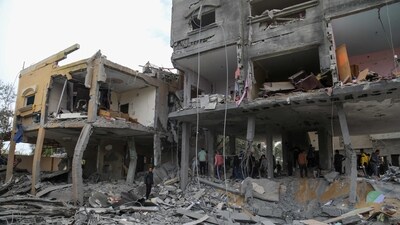 Palestinians search the rubble of a family home following Israeli bombardment west of the Nuseirat refugee camp in the central Gaza Strip. (AFP) Palestinians search the rubble of a family home following Israeli bombardment west of the Nuseirat refugee camp in the central Gaza Strip. (AFP)