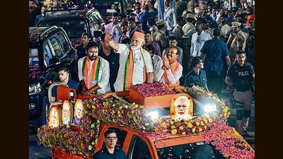 Prime Minister Narendra Modi during a road show in Malkajgiri Parliamentary constituency, in Hyderabad. (ANI) Prime Minister Narendra Modi during a road show in Malkajgiri Parliamentary constituency, in Hyderabad. (ANI)