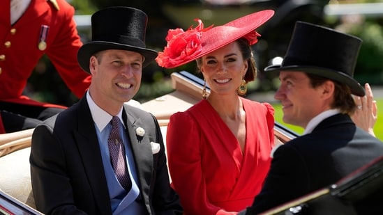 FILE - Britain's Prince William, left, and Kate, Princess of Wales arrive for the Royal Ascot horse racing meeting, at Ascot Racecourse in Ascot, England, Friday, June 23, 2023. Attention on Princess Kate has reached levels not seen since she married Prince William in a fairy-tale wedding in 2011. An admission from Kate that she altered an official family photo triggered a backlash. (AP Photo/Alastair Grant, File) (AP)