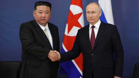 Russian President Vladimir Putin, right, and North Korean leader Kim Jong Un (AP)