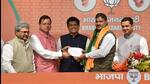 Congress MLA from Badrinath assembly constituency Rajendra Singh Bhandari joining the BJP in presence of Union minister Piyush Goyal and Uttarakhand chief minister Pushkar Singh Dhami in Delhi on Sunday.