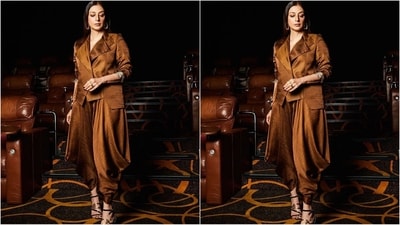 Her outfit, in an enchanting shade of copper, featured a chic blazer that she paired with matching dhoti pants, creating the perfect blend of elegance and flair that made her outfit a total stunner. (Instagram/@sanamratansi) Her outfit, in an enchanting shade of copper, featured a chic blazer that she paired with matching dhoti pants, creating the perfect blend of elegance and flair that made her outfit a total stunner. (Instagram/@sanamratansi)
