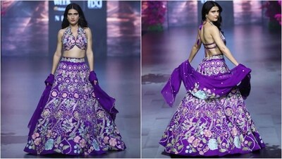 Fatima Sana Shaikh's showstopper look for Arvind Ampula was all about elegance and sartorial flair as she set the ramp ablaze in a purple halterneck bralette and lehenga skirt combo. Her outfit is adorned with intricate floral embroidery in shades of green and blue, adding a touch of style and flair. With subtle make-up and loose hair, she looked simply stunning. (Instagram/@lakmefashionwk) Fatima Sana Shaikh's showstopper look for Arvind Ampula was all about elegance and sartorial flair as she set the ramp ablaze in a purple halterneck bralette and lehenga skirt combo. Her outfit is adorned with intricate floral embroidery in shades of green and blue, adding a touch of style and flair. With subtle make-up and loose hair, she looked simply stunning. (Instagram/@lakmefashionwk)