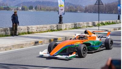A participant at the Formula-4 Indian Racing Festival 2024 near the Dal Lake in Srinagar on Sunday. (PTI)
