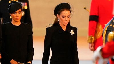 Queen Elizabeth II's Funeral: Prince Harry, Meghan, the Duchess of Sussex, Kate, Princess of Wales follow the bearer party carrying the coffin of Queen Elizabeth II. (AP) Queen Elizabeth II's Funeral: Prince Harry, Meghan, the Duchess of Sussex, Kate, Princess of Wales follow the bearer party carrying the coffin of Queen Elizabeth II. (AP)