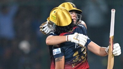 Chasing 114 runs, RCB reached 115/2 in 19.3 overs, courtesy of an unbeaten knock of 35 runs off 37 balls by Ellyse Perry. (AFP) Chasing 114 runs, RCB reached 115/2 in 19.3 overs, courtesy of an unbeaten knock of 35 runs off 37 balls by Ellyse Perry. (AFP)