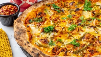 This Ramadan, bring zesty twist to your iftar table with delicious Chicken Tikka Pizza | Recipe inside (Photo by The Greedyman Pizzeria) This Ramadan, bring zesty twist to your iftar table with delicious Chicken Tikka Pizza | Recipe inside (Photo by The Greedyman Pizzeria)