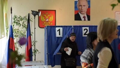 A man votes in Russia's presidential election at a polling station in Donetsk, Russian-controlled Ukraine, amid the Russia-Ukraine conflict on March 16, 2024. (AFP) A man votes in Russia's presidential election at a polling station in Donetsk, Russian-controlled Ukraine, amid the Russia-Ukraine conflict on March 16, 2024. (AFP)