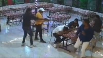 Two men fired at Dhanve and then four people with sickles hacked him to death.