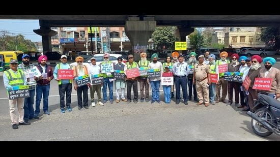 Green activists from Public Action Committee and Buddha Darya Action Front holding an awareness rally at Bhaiwala Chowk in Ludhiana on Sunday. (HT Photo)