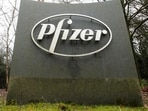 The Pfizer logo is seen at their UK commercial headquarters in Walton Oaks, Britain. 