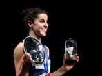 Carolina Marin celebrates on the podium. Carolina Marin celebrates on the podium.