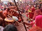 People of Nandgaon and Barsana celebrate Lathmar Holi. As unique as it sounds, the tradition dates back to the time when Lord Krishna used to visit Goddess Radha. (HT FILE)