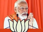Prime Minister Narendra Modi joins hands while addressing the crowd in Telangana. Prime Minister Narendra Modi joins hands while addressing the crowd in Telangana.