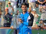 Indian Wells, CA, USA;  Carlos Alcaraz (ESP) with the championship trophy after defeating Daniil Medvedev (RUS) in the men’s final of the BNP Paribas open at the Indian Wells Tennis Garden