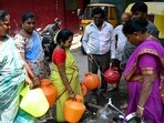 Residents in Bengaluru filling their water cans from a municipal tap in Bengaluru amid the ongoing water crisis. Residents in Bengaluru filling their water cans from a municipal tap in Bengaluru amid the ongoing water crisis.