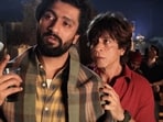 Vicky Kaushal and Shah Rukh Khan in a still from Dunki. Vicky Kaushal and Shah Rukh Khan in a still from Dunki.