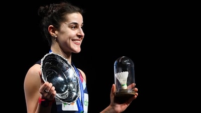 Carolina Marin celebrates on the podium. (AFP) Carolina Marin celebrates on the podium. (AFP)