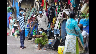 Mumbai: A girl looks on through the window of her house during a nationwide lockdown in the wake of coronavirus pandemic, at Dharavi in Mumbai, Thursday, April 2, 2020. The death of a COVID-19 patient from Mumbai's Dharavi, known as one of the biggest slums in Asia, has exposed its residents to the vulnerability of contracting the viral infection and sparked a fear of its spread in the highly congested area. (PTI Photo/Kunal Patil)(PTI02-04-2020_000134B) (PTI) Mumbai: A girl looks on through the window of her house during a nationwide lockdown in the wake of coronavirus pandemic, at Dharavi in Mumbai, Thursday, April 2, 2020. The death of a COVID-19 patient from Mumbai's Dharavi, known as one of the biggest slums in Asia, has exposed its residents to the vulnerability of contracting the viral infection and sparked a fear of its spread in the highly congested area. (PTI Photo/Kunal Patil)(PTI02-04-2020_000134B) (PTI)