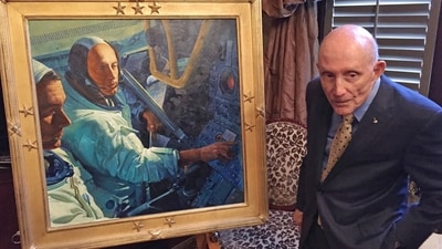 Retired NASA astronaut Tom Stafford, a native of Weatherford, Okla.,, who flew the first lunar module to the moon in 1969, stands in front of a portrait made in his honor (AP) Retired NASA astronaut Tom Stafford, a native of Weatherford, Okla.,, who flew the first lunar module to the moon in 1969, stands in front of a portrait made in his honor (AP)