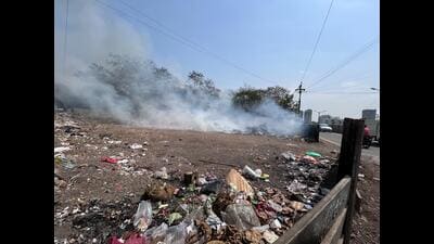 On Sunday afternoon, a fire incident was reported in Kharadi, wherein herds of garbage were illegally burned near Zensar IT company. (HT PHOTO) On Sunday afternoon, a fire incident was reported in Kharadi, wherein herds of garbage were illegally burned near Zensar IT company. (HT PHOTO)