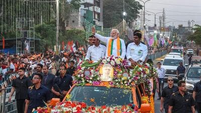 Prime Minister Narendra Modi during a roadshow in Coimbatore on Monday. (PTI) Prime Minister Narendra Modi during a roadshow in Coimbatore on Monday. (PTI)