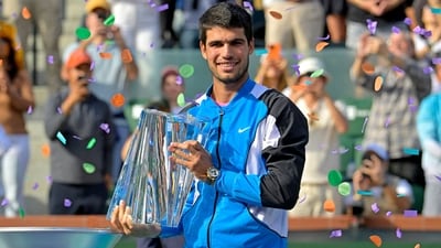 Indian Wells, CA, USA;  Carlos Alcaraz (ESP) with the championship trophy after defeating Daniil Medvedev (RUS) in the men’s final of the BNP Paribas open at the Indian Wells Tennis Garden (USA TODAY Sports via Reuters Con)
