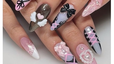 Flaunt your charm in this cute trend of wearing pretty bows with stones and shimmer on the nails (Instagram)
