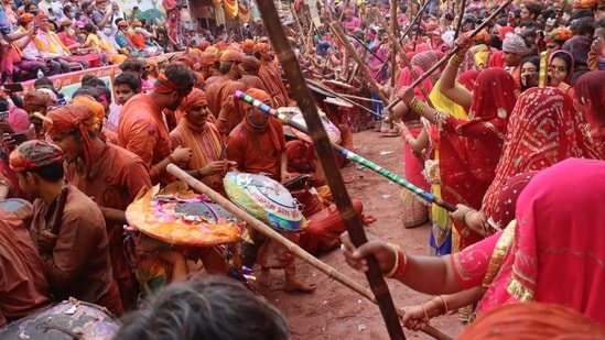 People of Nandgaon and Barsana celebrate Lathmar Holi. As unique as it sounds, the tradition dates back to the time when Lord Krishna used to visit Goddess Radha. (HT FILE)