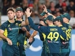 Australia's Mitchell Marsh (L) with teammates Australia's Mitchell Marsh (L) with teammates