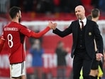 Portuguese midfielder #08 Bruno Fernandes (L) and Manchester United's Dutch manager Erik ten Hag (R) celebrate on the pitch Portuguese midfielder #08 Bruno Fernandes (L) and Manchester United's Dutch manager Erik ten Hag (R) celebrate on the pitch