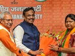 JMM legislator Sita Soren being felicitated by BJP leaders Vinod Tawde and Laxmikant Bajpai as she joins the party in New Delhi on Tuesday.