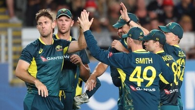 Australia's Mitchell Marsh (L) with teammates (AFP) Australia's Mitchell Marsh (L) with teammates (AFP)