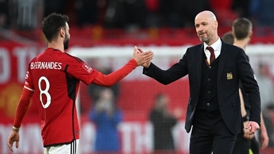 Portuguese midfielder #08 Bruno Fernandes (L) and Manchester United's Dutch manager Erik ten Hag (R) celebrate on the pitch (AFP) Portuguese midfielder #08 Bruno Fernandes (L) and Manchester United's Dutch manager Erik ten Hag (R) celebrate on the pitch (AFP)