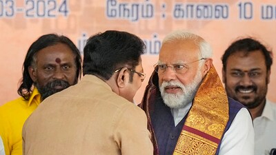 Salem: Prime Minister Narendra Modi with Amma Makkal Munnetra Kazhagam (AMMK) general secretary T.T.V. Dhinakaran during a public meeting ahead of Lok Sabha elections, in Salem, Tuesday, March 19, 2024. (PTI Photo/R Senthil Kumar)(PTI03_19_2024_000190B) (PTI) Salem: Prime Minister Narendra Modi with Amma Makkal Munnetra Kazhagam (AMMK) general secretary T.T.V. Dhinakaran during a public meeting ahead of Lok Sabha elections, in Salem, Tuesday, March 19, 2024. (PTI Photo/R Senthil Kumar)(PTI03_19_2024_000190B) (PTI)