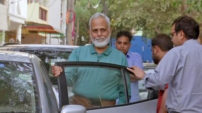 Satyendar Jain leaves his house for Tihar Jail on Monday. (ANI) (HT_PRINT) Satyendar Jain leaves his house for Tihar Jail on Monday. (ANI) (HT_PRINT)