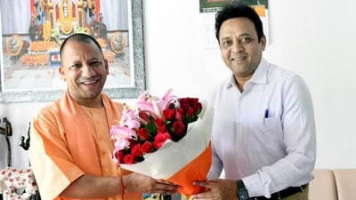 Sanjay Prasad (right) with Yogi Adityanath (Twitter/@sanjaychapps1) Sanjay Prasad (right) with Yogi Adityanath (Twitter/@sanjaychapps1)