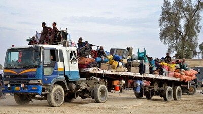 Afghan refugees with their belongings arrive on a truck from Pakistan, at a registration centre near the Afghanistan-Pakistan border in the Spin Boldak district of Kandahar province. (AFP) Afghan refugees with their belongings arrive on a truck from Pakistan, at a registration centre near the Afghanistan-Pakistan border in the Spin Boldak district of Kandahar province. (AFP)