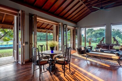 Add a touch of charm with rich, dark hardwood flooring and elegant Victorian furniture Add a touch of charm with rich, dark hardwood flooring and elegant Victorian furniture