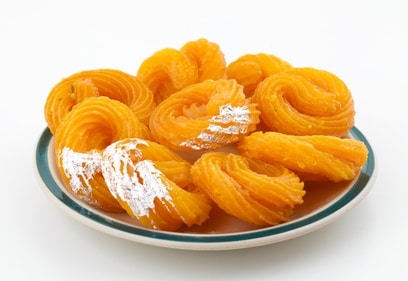 Paneer jalebi or chhena jalebi is prepared with fresh cottage cheese and relished in West Bengal (Shutterstock) Paneer jalebi or chhena jalebi is prepared with fresh cottage cheese and relished in West Bengal (Shutterstock)